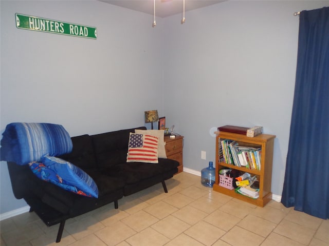 sitting room with light tile patterned floors