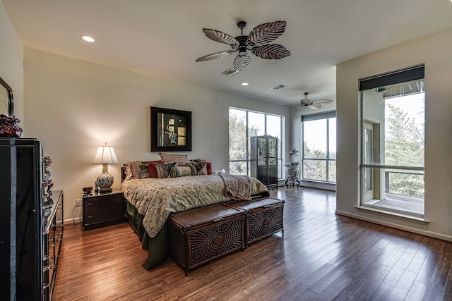 bedroom featuring ceiling fan, hardwood / wood-style flooring, and access to outside