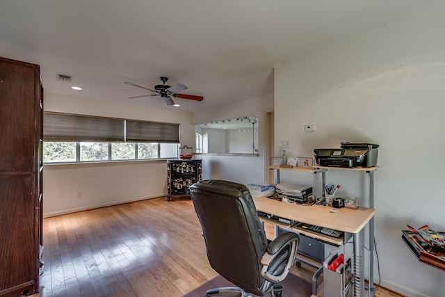 office featuring ceiling fan and light hardwood / wood-style flooring