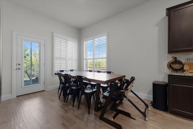 dining room featuring light hardwood / wood-style floors