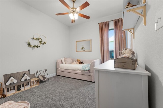 bedroom featuring ceiling fan and carpet floors