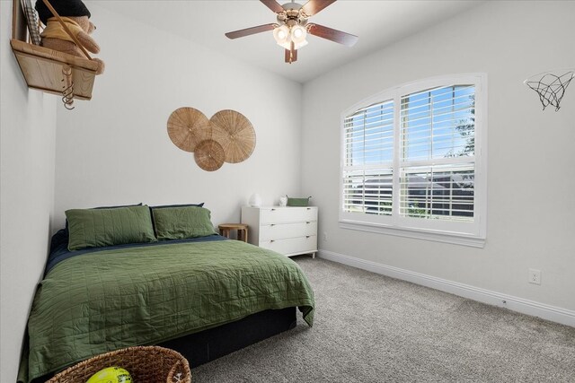 bedroom with ceiling fan and carpet flooring