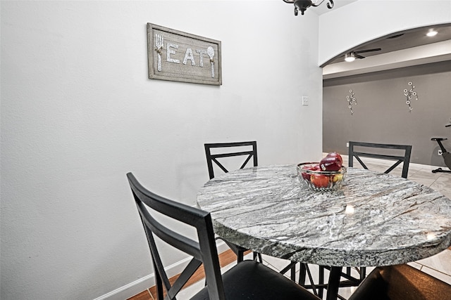 dining room featuring ceiling fan