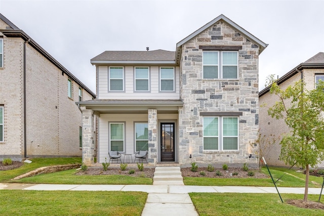 view of front of house with a front lawn