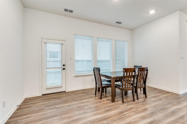 dining room with light wood-type flooring