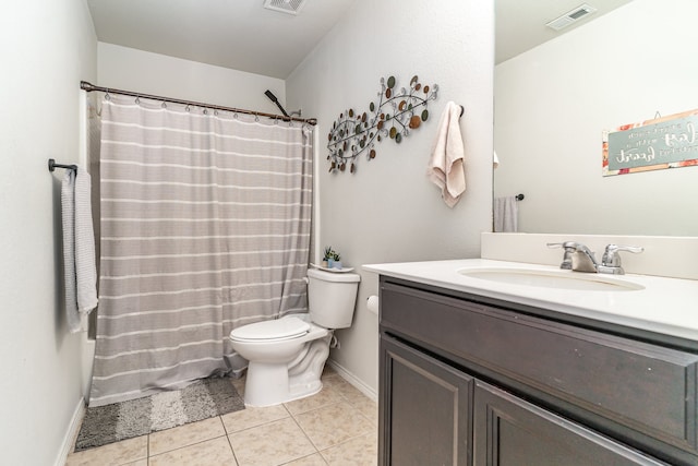 bathroom featuring a shower with shower curtain, tile patterned floors, vanity, and toilet