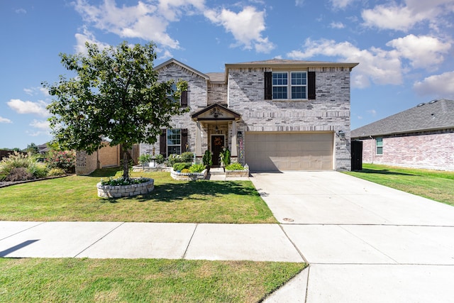 view of front of property featuring a front lawn and a garage