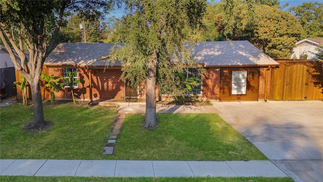 view of front of property with a front lawn, central air condition unit, and a patio area