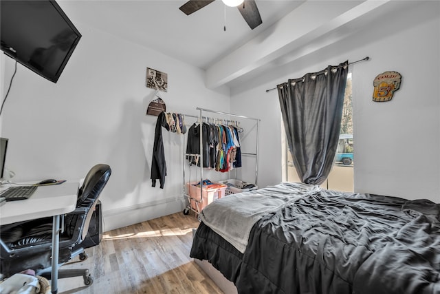 bedroom with ceiling fan and light hardwood / wood-style floors