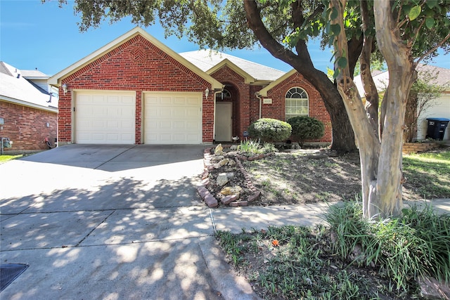 single story home with a garage