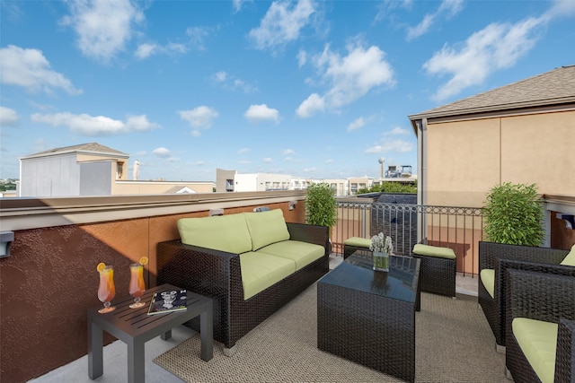 view of patio / terrace featuring an outdoor hangout area and a balcony