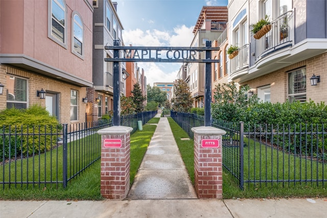 view of community featuring a yard