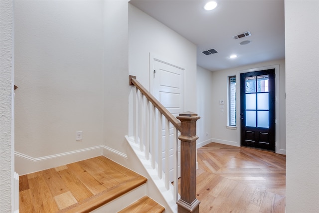 entrance foyer with parquet flooring