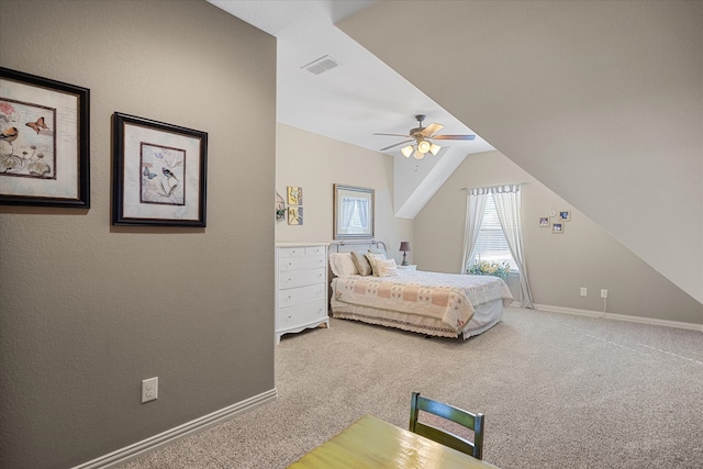 bedroom with carpet, ceiling fan, and lofted ceiling