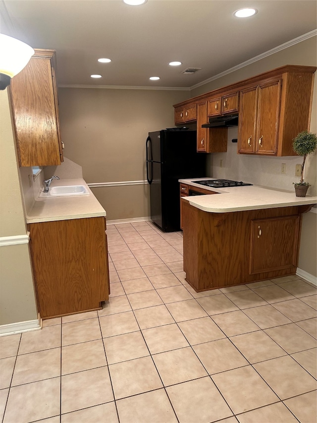 kitchen with light tile patterned floors, ornamental molding, sink, kitchen peninsula, and black appliances