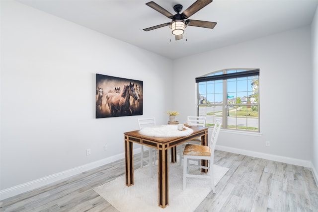 unfurnished dining area featuring light hardwood / wood-style flooring and ceiling fan