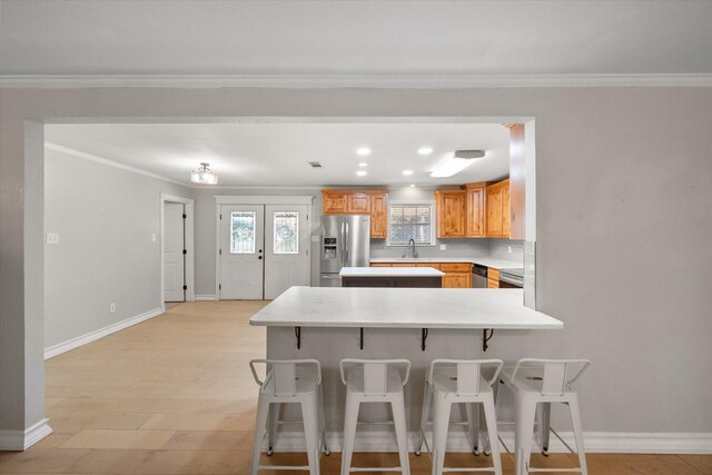 kitchen with stainless steel appliances, tasteful backsplash, and sink