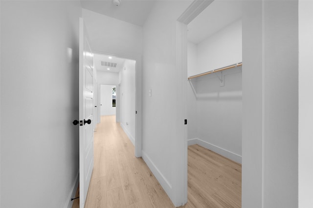 hallway featuring light hardwood / wood-style floors