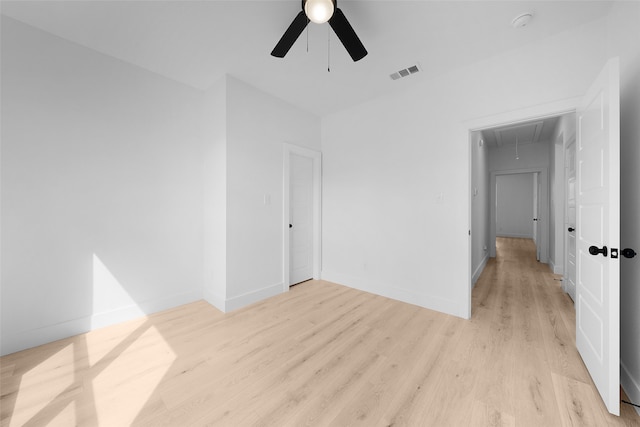 unfurnished room with ceiling fan and light hardwood / wood-style flooring