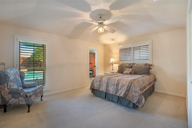 bedroom featuring ceiling fan, carpet floors, and baseboards