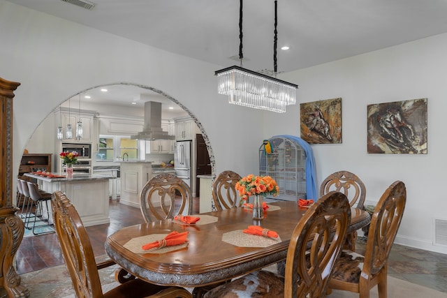 dining area featuring a chandelier