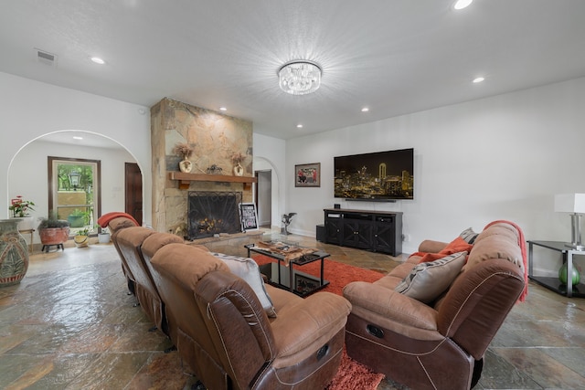 living room featuring a fireplace