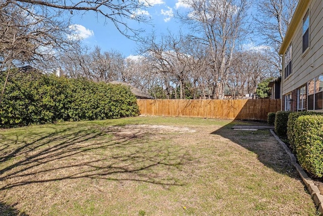 view of yard featuring fence