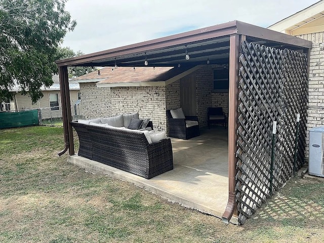 view of patio featuring outdoor lounge area and ac unit