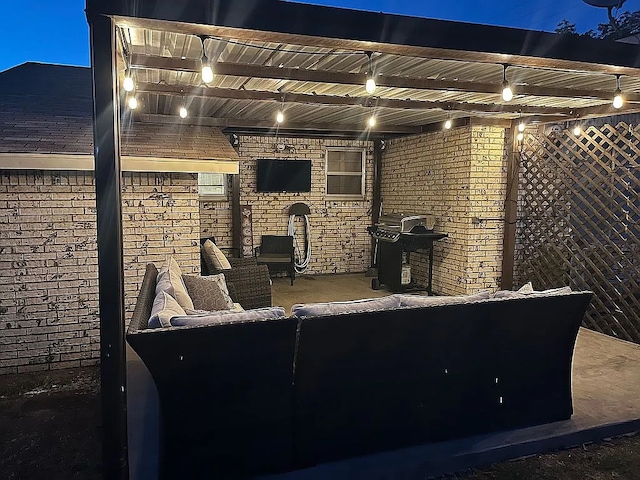 view of patio with an outdoor hangout area and a grill