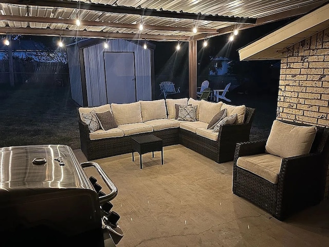 view of patio with a storage shed and an outdoor hangout area