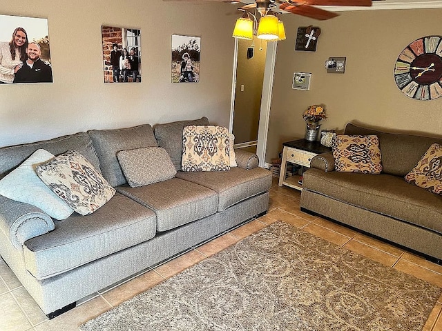 living room with tile patterned flooring and ceiling fan