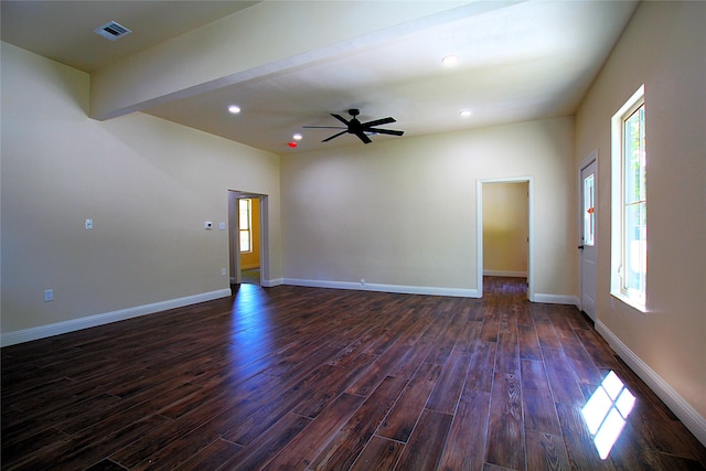 spare room with ceiling fan and dark hardwood / wood-style floors