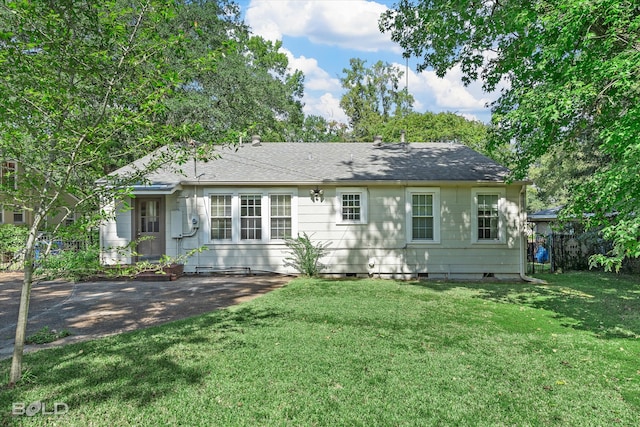 view of front of home with a front yard