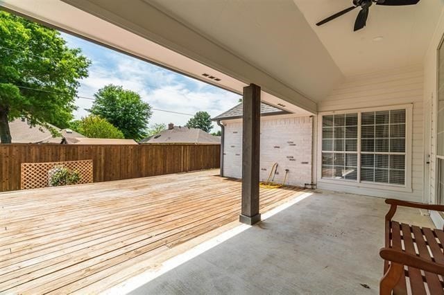 exterior space with ceiling fan and a wooden deck