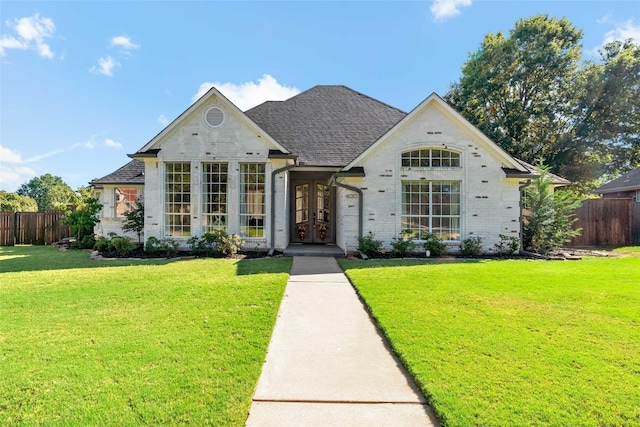 view of front facade with a front lawn