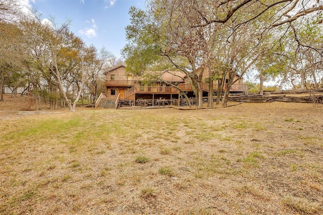 view of yard featuring a deck