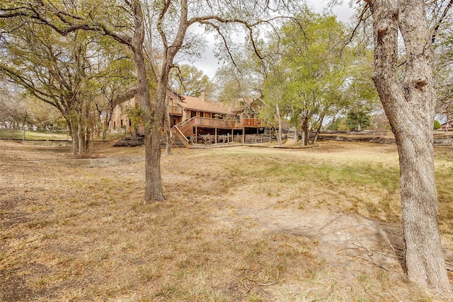 view of yard with a deck