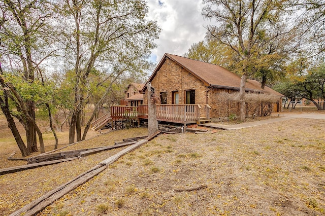 view of front facade featuring a wooden deck