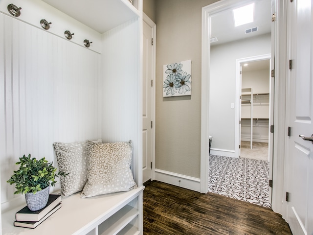 mudroom with dark hardwood / wood-style flooring