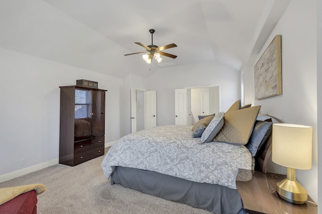 bedroom featuring ceiling fan, lofted ceiling, and carpet