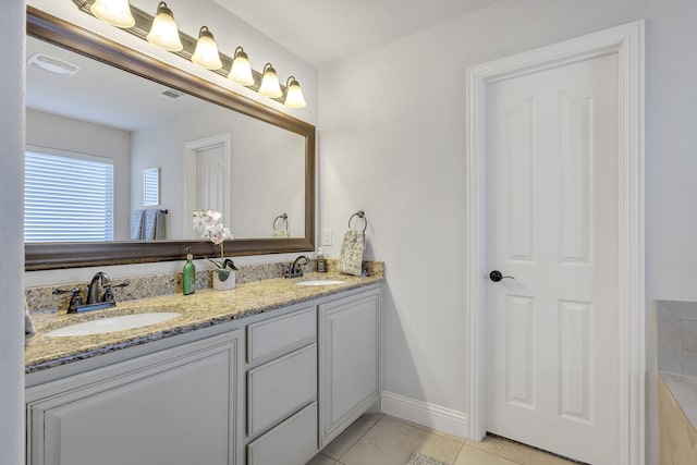 bathroom featuring vanity and tile patterned floors