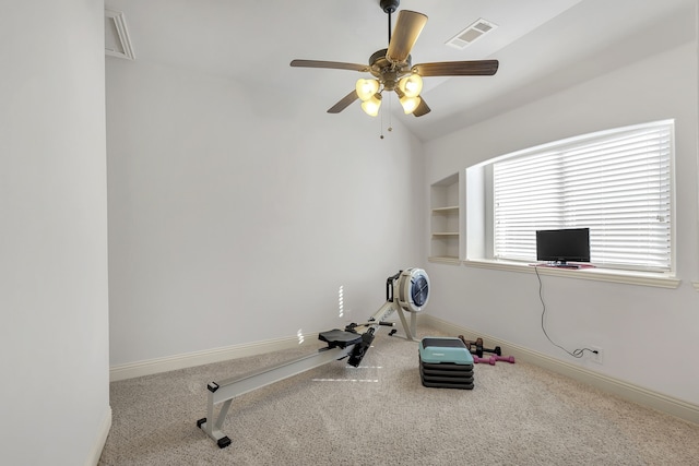 workout room with carpet, vaulted ceiling, and ceiling fan