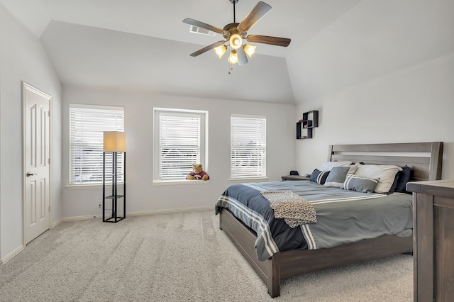 carpeted bedroom with lofted ceiling and ceiling fan