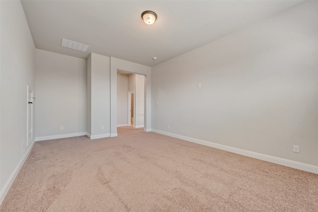 unfurnished bedroom with light carpet