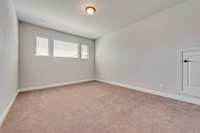 empty room with carpet flooring