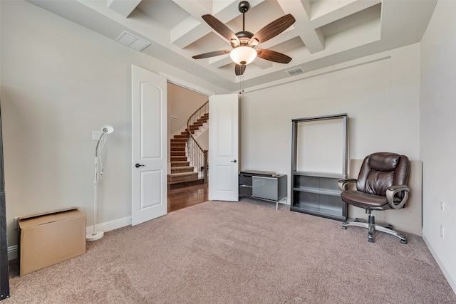 sitting room featuring light carpet, beamed ceiling, coffered ceiling, and ceiling fan