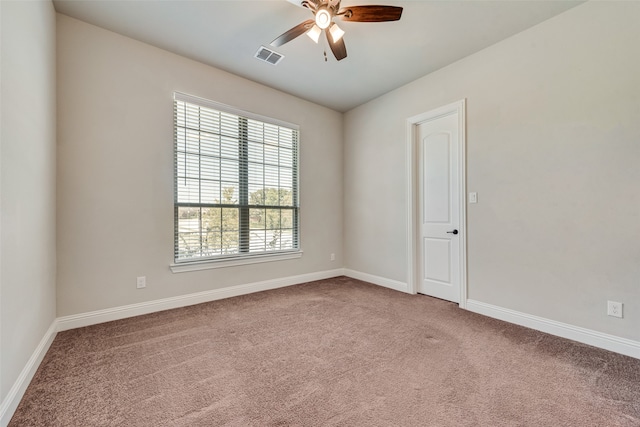 unfurnished room with carpet floors and ceiling fan