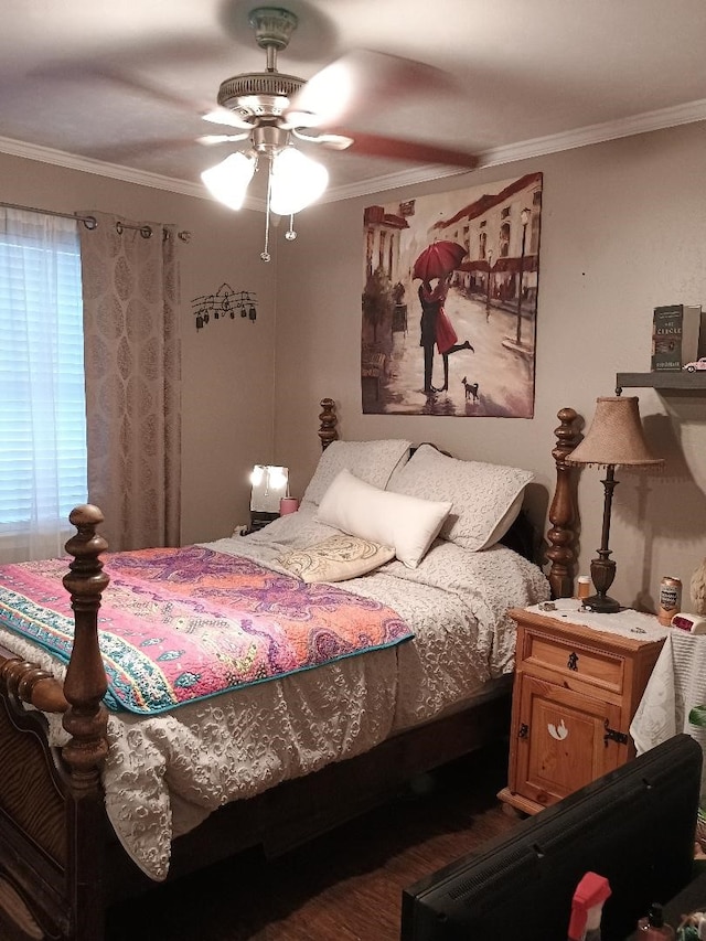 bedroom with crown molding, ceiling fan, and dark wood-type flooring