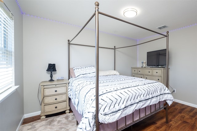 bedroom featuring hardwood / wood-style floors