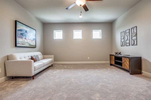 sitting room with light carpet and ceiling fan